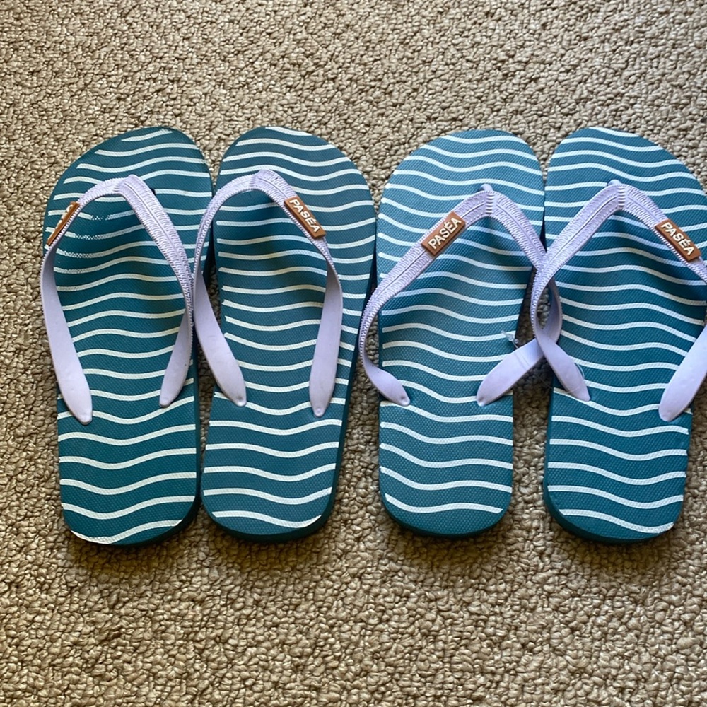 Two Pairs of Pasea Flip Flops. Size 10.‎ One brand new pair.